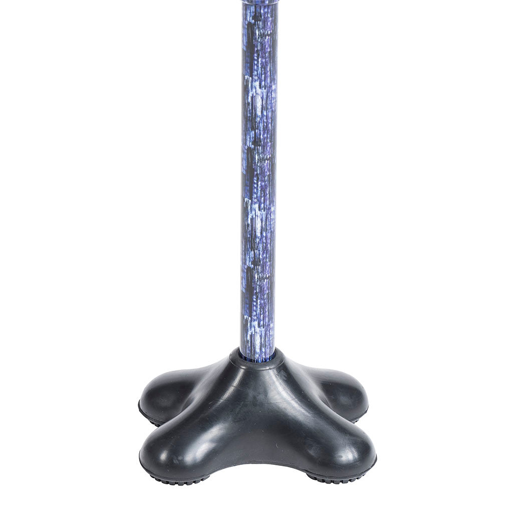 Quad cane tip with four-lobed black rubber base attached to a blue patterned cane shaft
