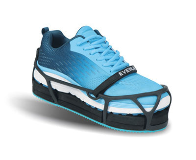 Shoe leveler orthotic lift attached to a blue lace-up athletic sneaker, shown from a side angle on white background