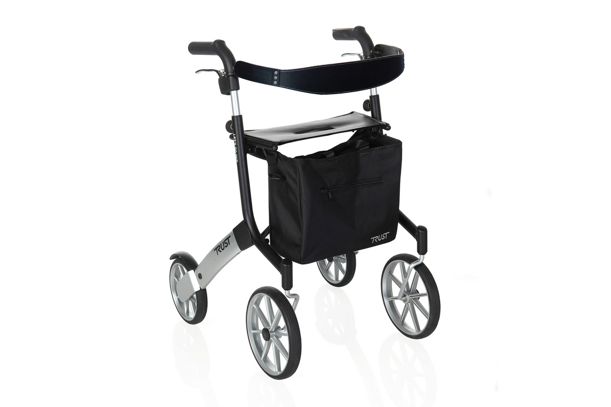 Four-wheel rollator with black padded seat, hand brakes, storage bag, and large spoke wheels on white background