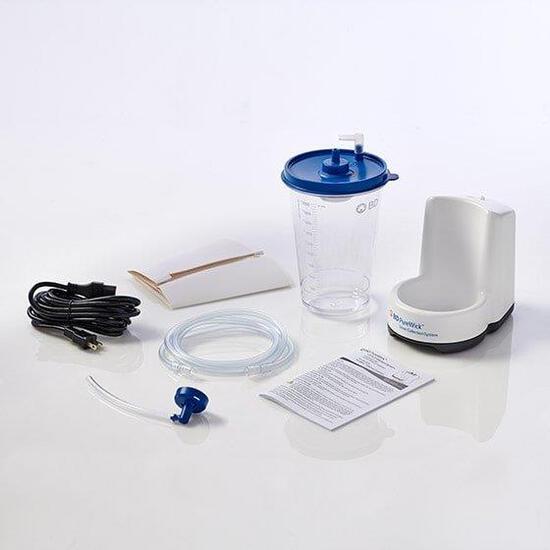 Urine collection system kit with base unit, graduated collection canister, tubing, suction tip, power cords, and instruction