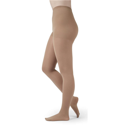 Compression pantyhose in beige with closed toe and non-adjustable waistband, shown on lower body side view