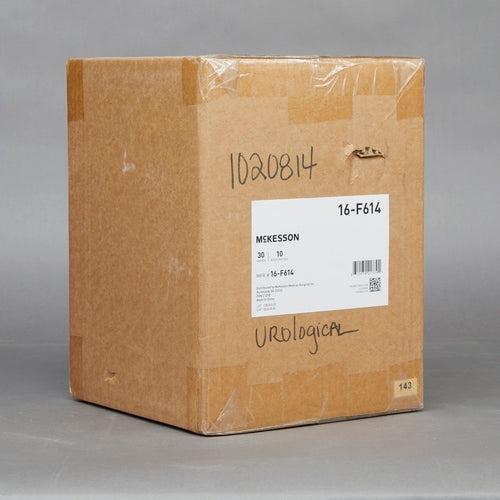 Urethral catheter bulk shipping box labeled McKesson urological supplies, handwritten item number on cardboard exterior