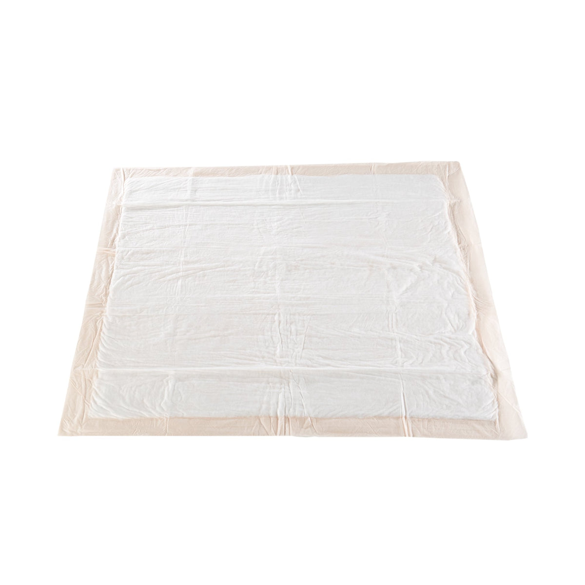 Disposable underpad laid flat, white absorbent top layer with beige waterproof backing, square shape with folded creases