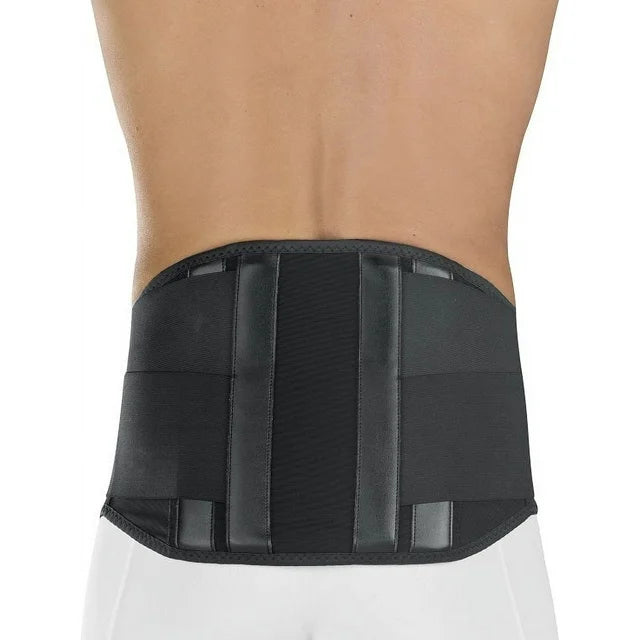 Lumbar back support brace in black with vertical stays and elastic panels, shown worn on a person's lower back, rear view