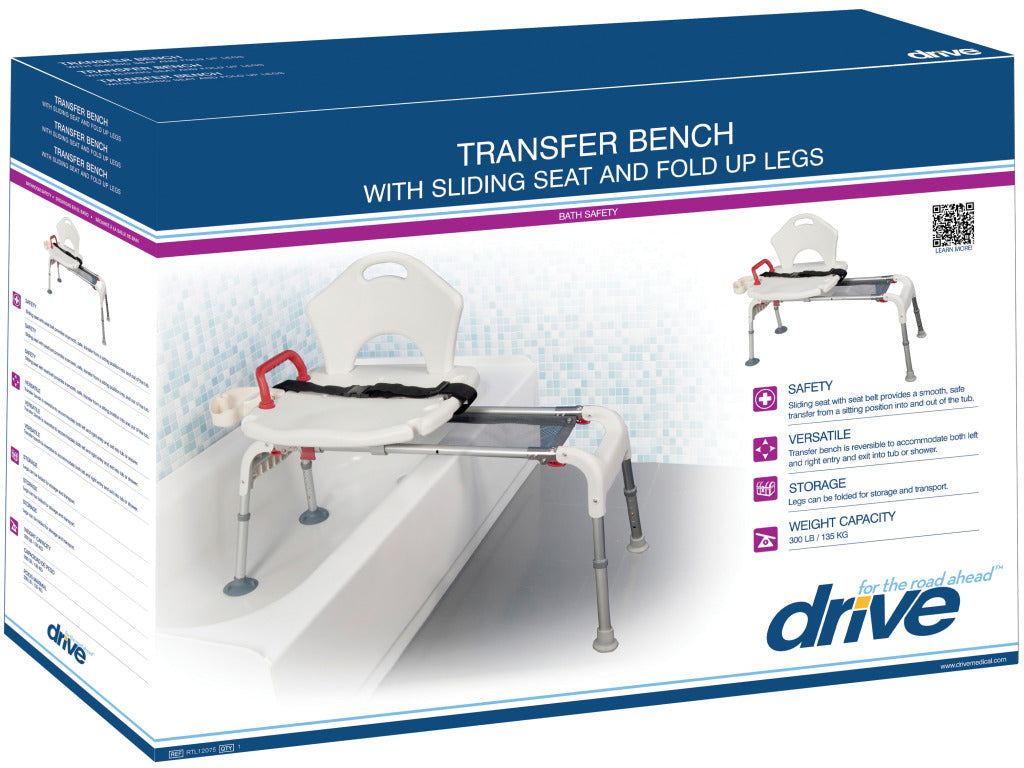 Transfer bench with sliding seat and fold-up legs shown in Drive Medical retail packaging, displayed over a bathtub