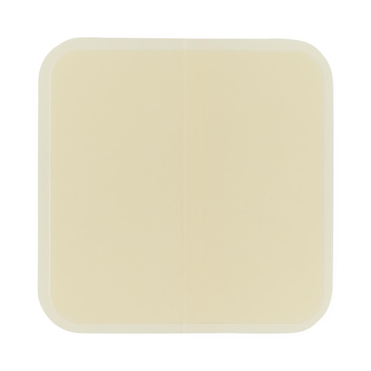 Hydrocolloid wound dressing, square shape with rounded corners, cream-colored with a center fold line, shown flat against
