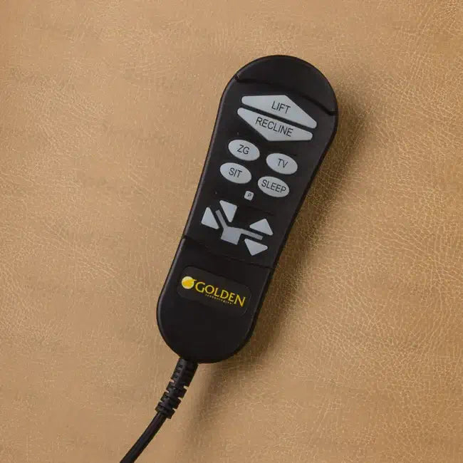 Lift chair hand remote control with lift, recline, sit, sleep, TV, and ZG position buttons on tan leather upholstery