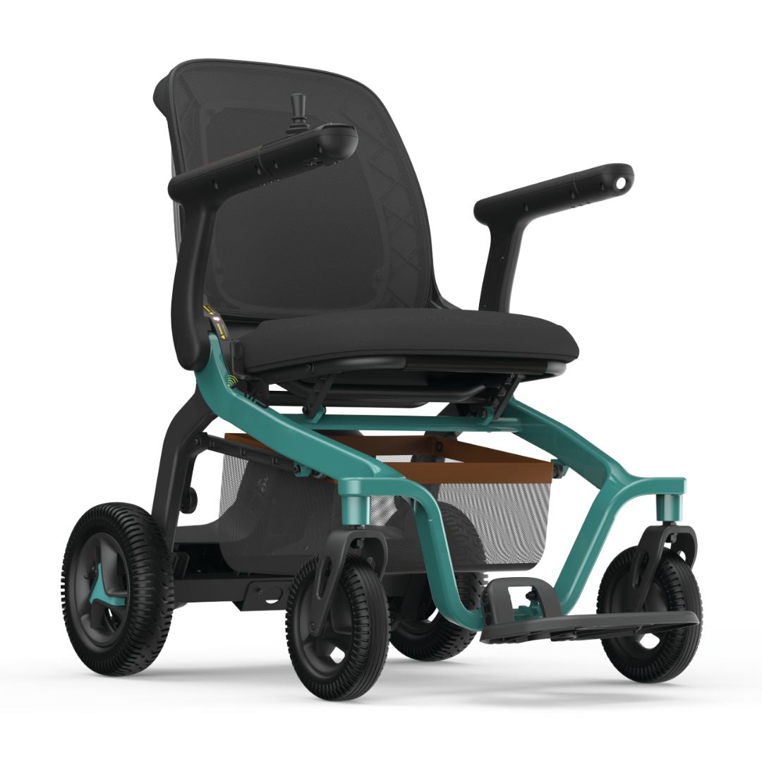Power wheelchair with teal frame, black mesh back, padded seat, joystick control, armrests, and four wheels on white