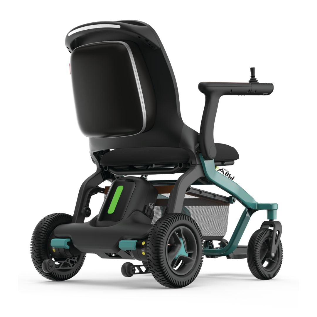 Golden Ally folding power wheelchair with teal frame, black high-back seat, joystick controller, and all-terrain wheels on