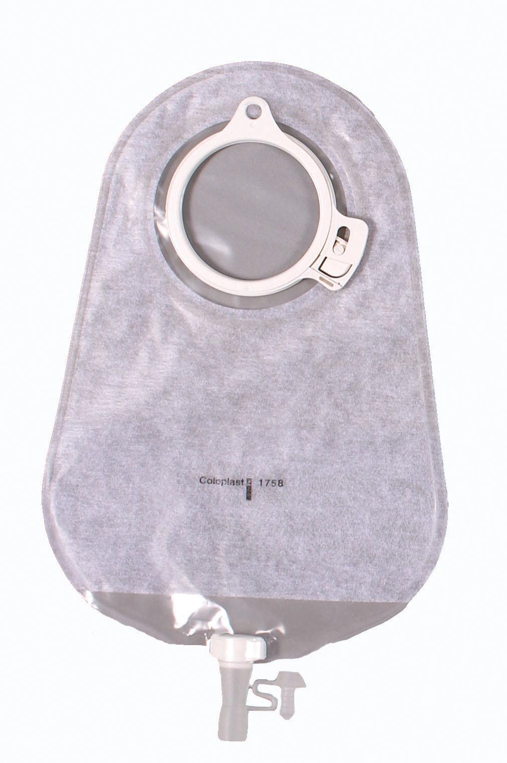 Assura 2-piece urostomy pouch with round coupling ring, locking closure, and bottom drain valve on gray fabric-covered pouch