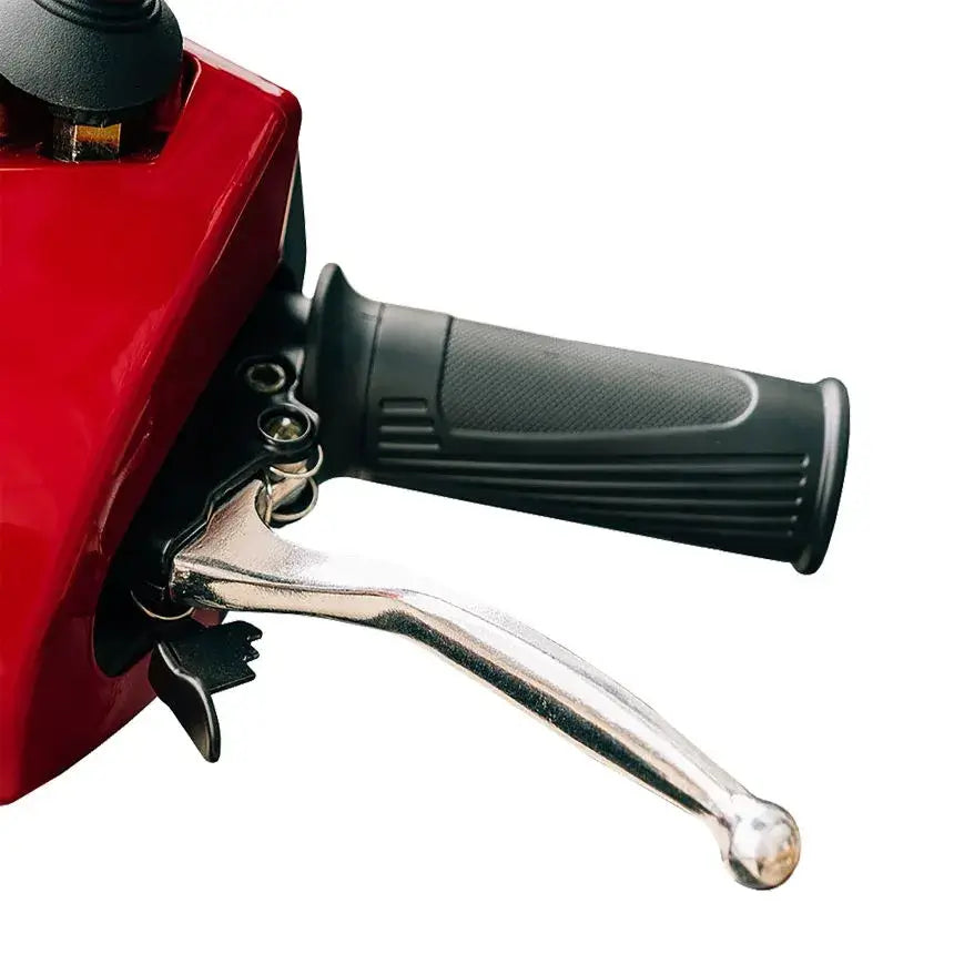 Mobility scooter handlebar grip and chrome brake lever on red tiller housing, close-up detail view