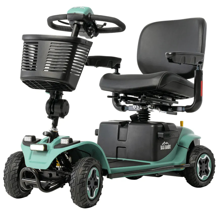 Four-wheel power mobility scooter in teal with black padded seat, front basket, steering tiller, headlights, and rugged