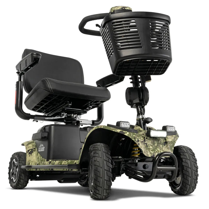 Power mobility scooter with camouflage body, four large off-road tires, front LED lights, black seat, and front storage