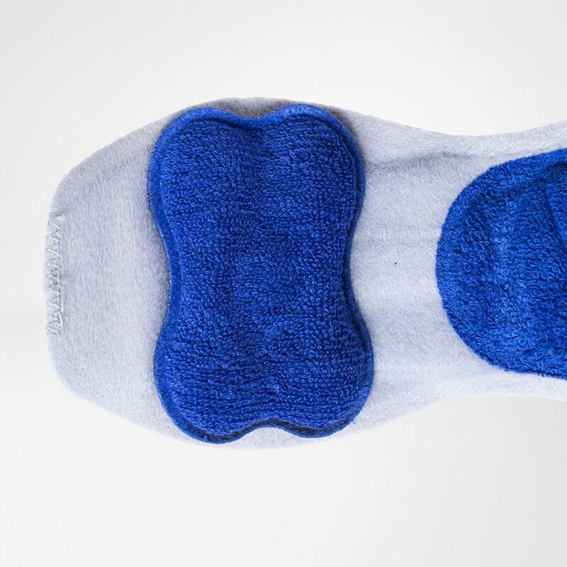 Elbow strap insole view showing gray fabric base with two blue textured terry cloth pressure pads at forefoot and heel zones