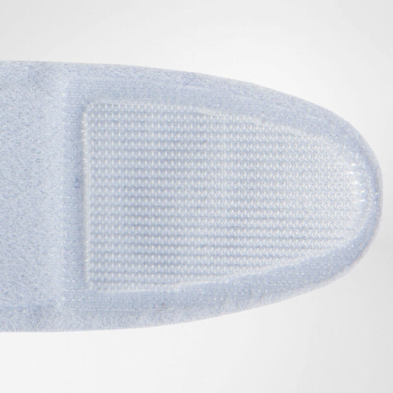 Elbow strap close-up showing light blue fabric with hook-and-loop fastener tab on white background