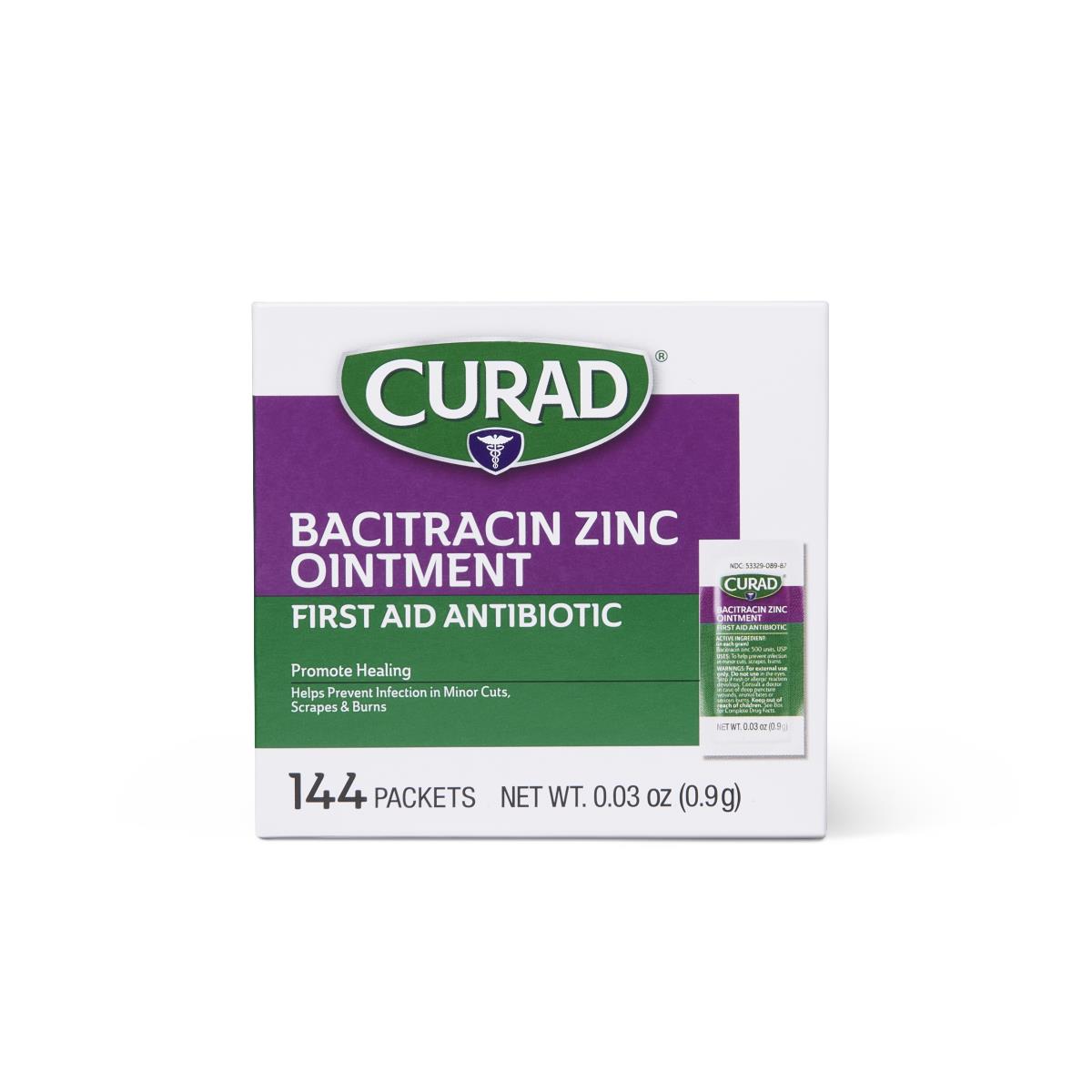 Bacitracin zinc ointment box by Curad, 144 single-use foil packets, with one packet displayed beside the box