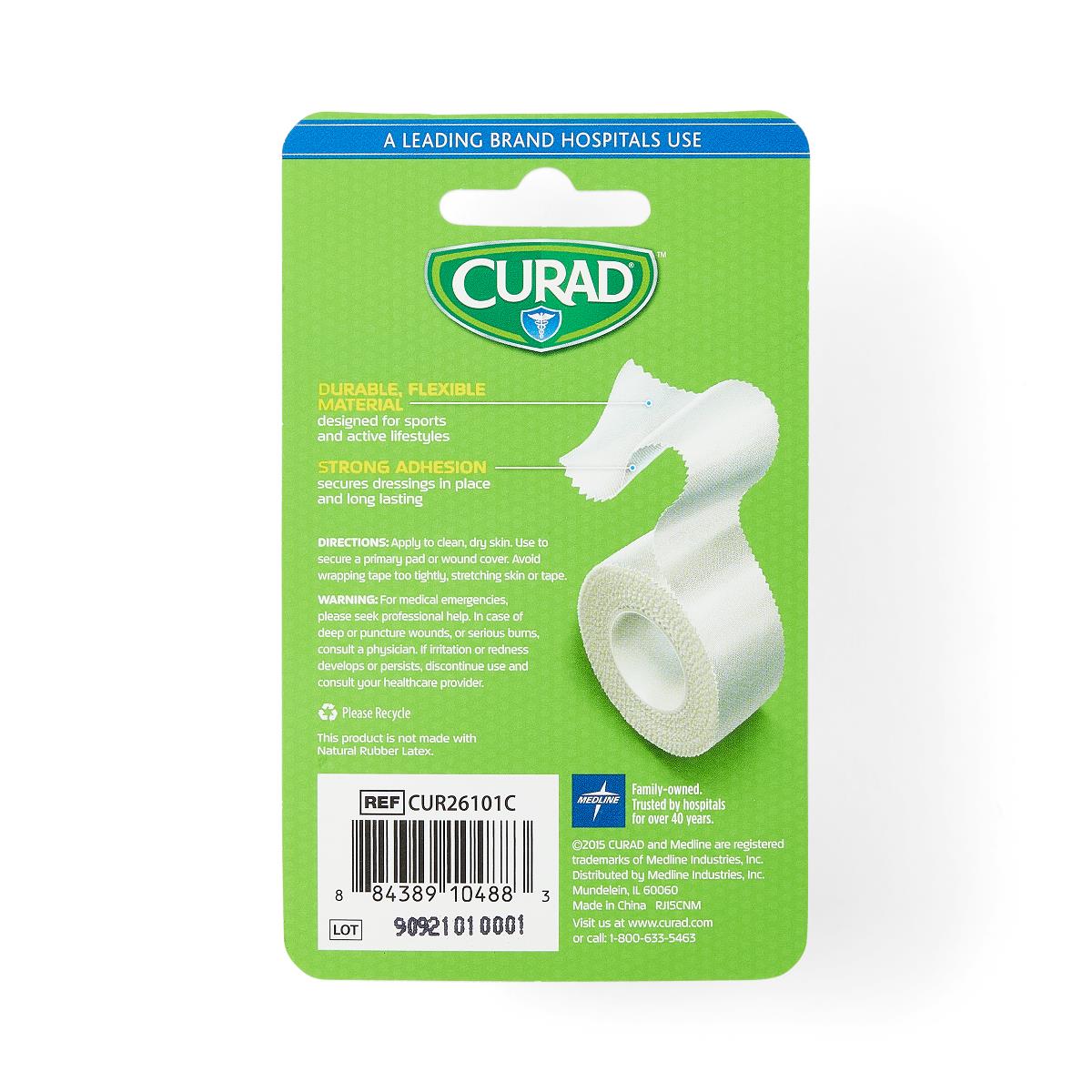 CURAD Heavy-Duty Cloth Medical Tape roll shown on back of green retail blister card packaging