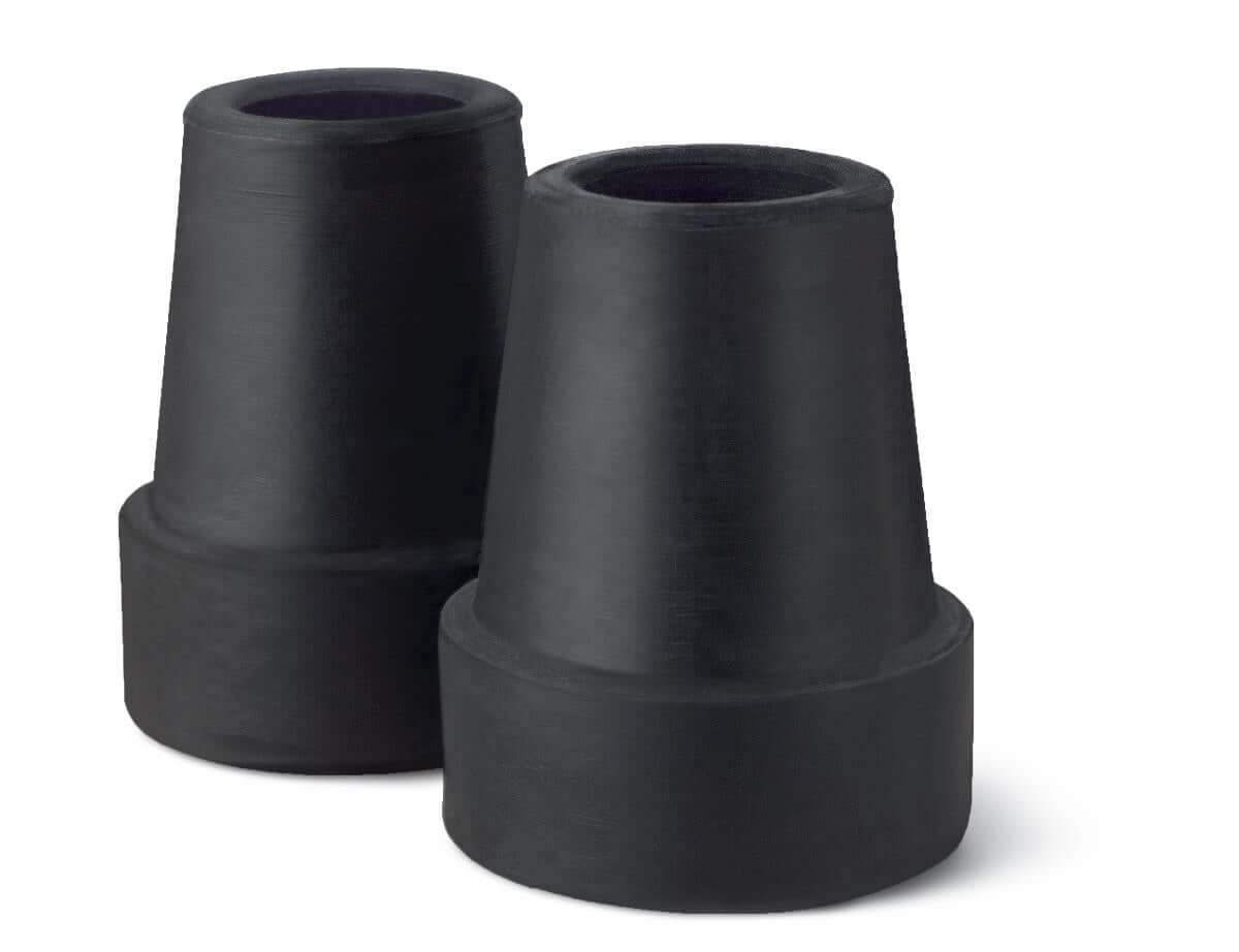 Pair of black rubber cane replacement tips with wide bases and hollow tops, shown on white background