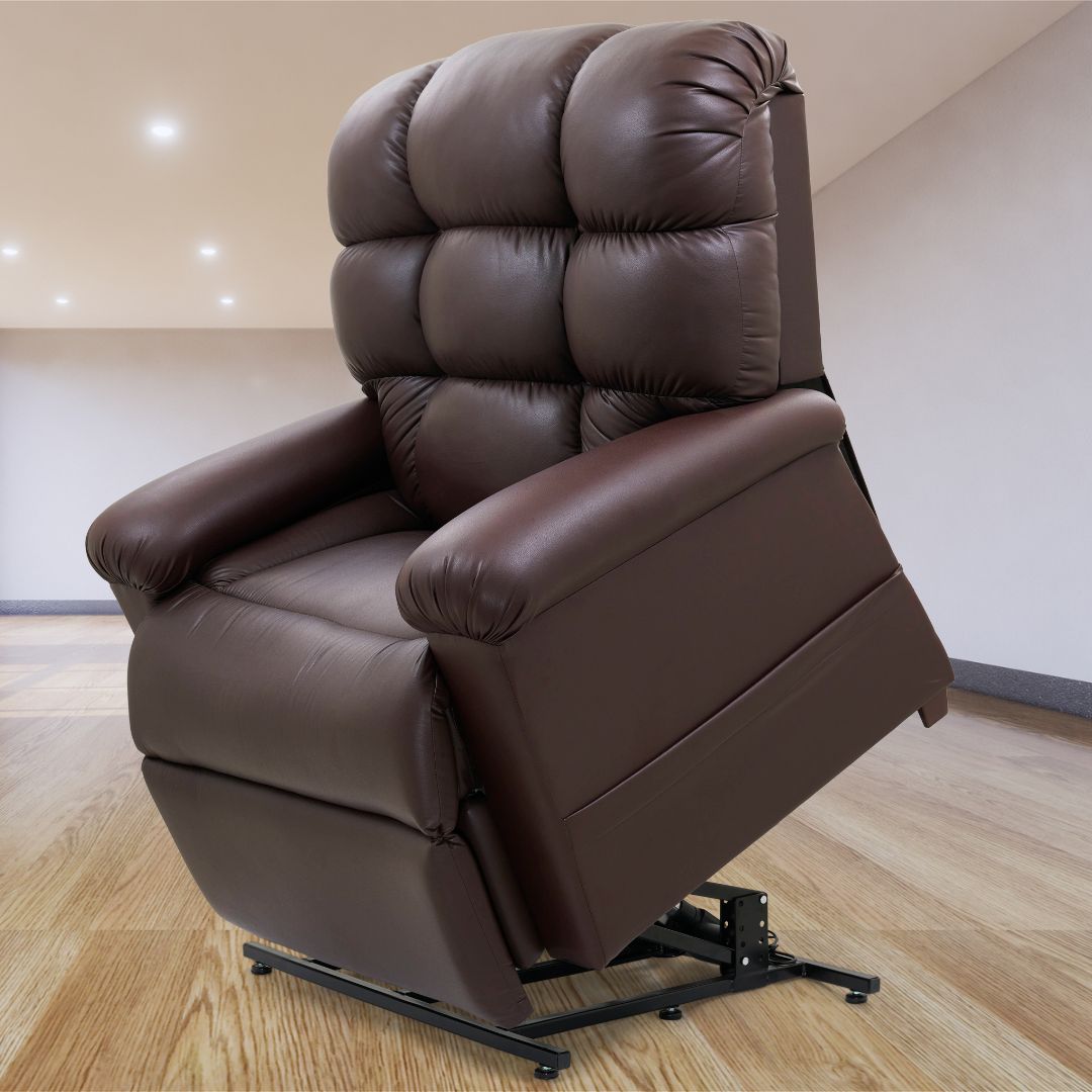 Power lift recliner chair in brown faux leather with tufted back, shown in lifted position on hardwood floor