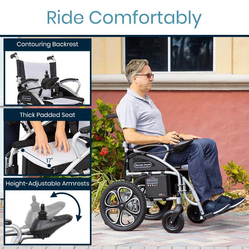 Power wheelchair with man seated outdoors, featuring contouring backrest, padded seat, height-adjustable armrests, and