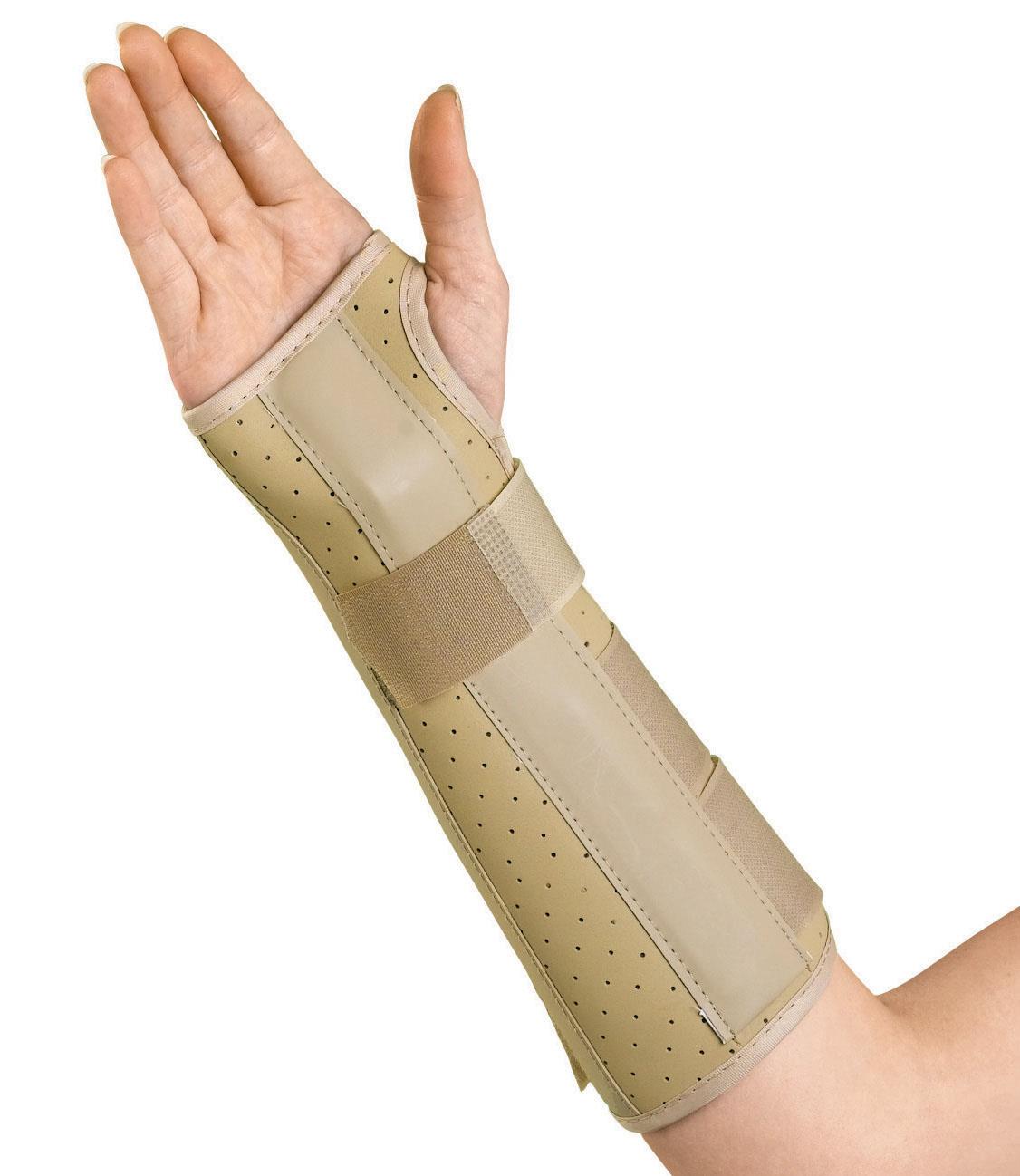 Vinyl wrist and forearm splint in beige with perforated panels and hook-and-loop straps, worn on a right hand and forearm