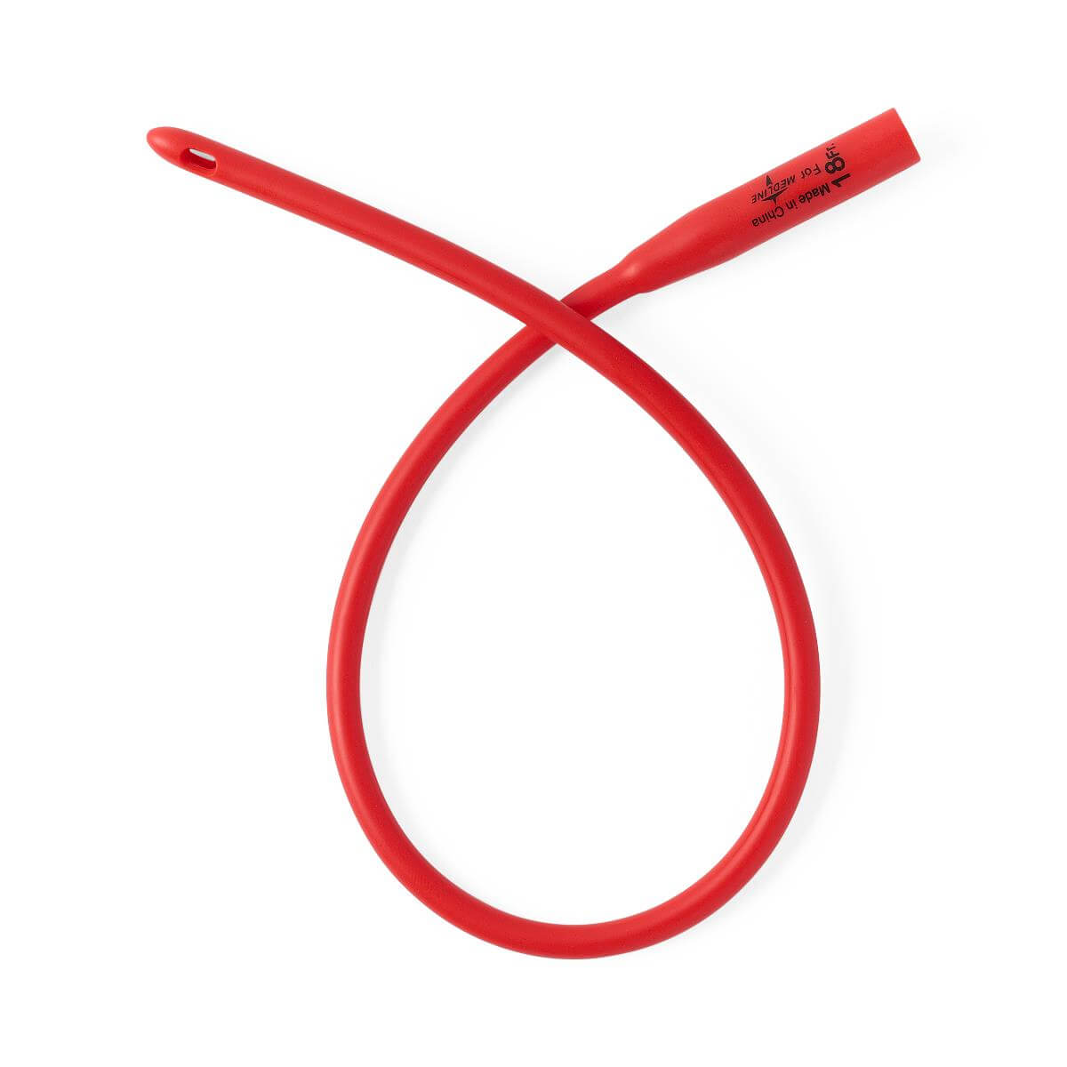 Red rubber urethral catheter coiled in a loop, showing rounded insertion tip with drainage eye and funnel end, 18FR size