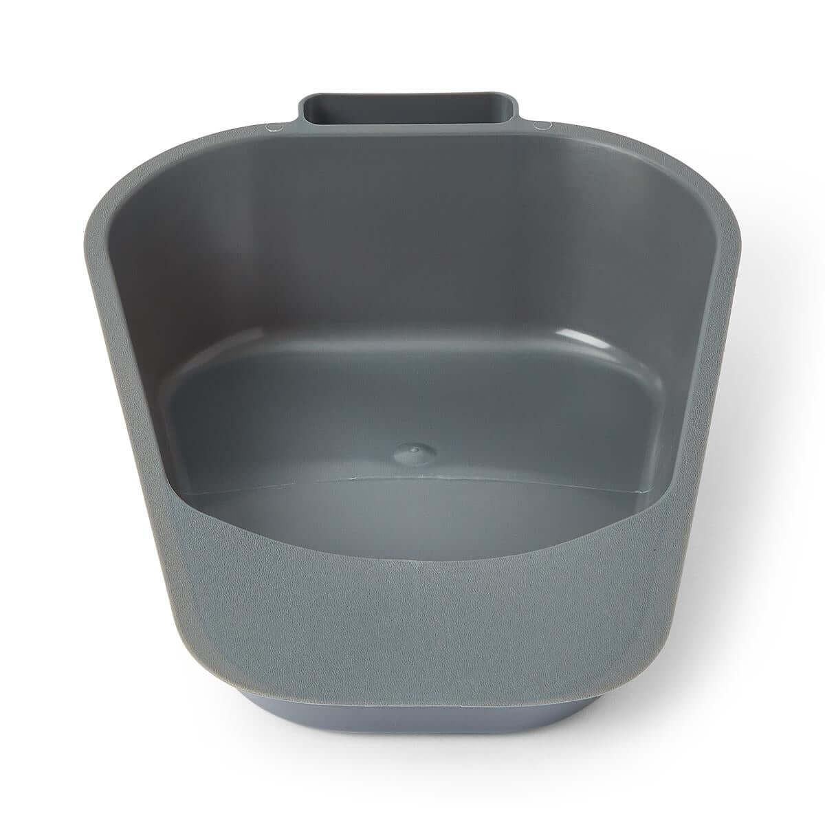 Fracture bedpan in graphite gray plastic with a low-profile design and handle, viewed from above at an angle