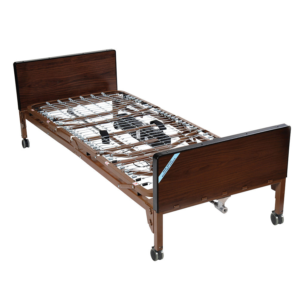 Full electric hospital bed with walnut wood headboard and footboard, articulating spring frame, and locking caster wheels