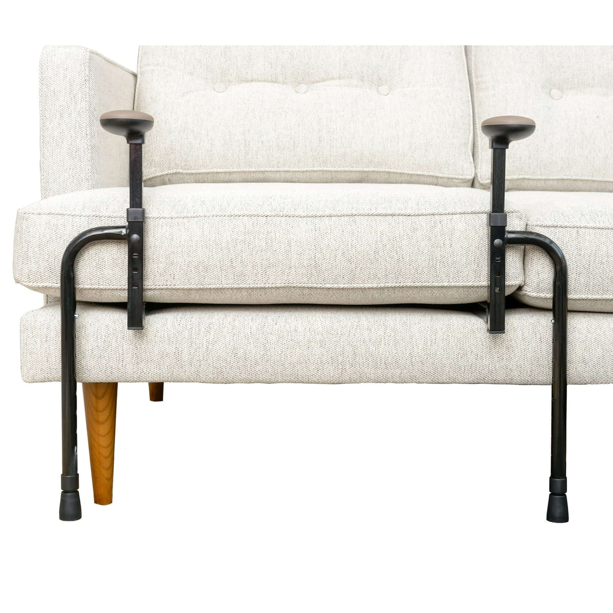 Couch stand assist handles, a pair of black metal support rails with cushioned grips clamped to sides of a white sofa