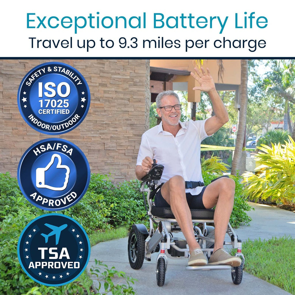 Folding power wheelchair shown outdoors with smiling man waving, featuring ISO, HSA/FSA, and TSA approval badges