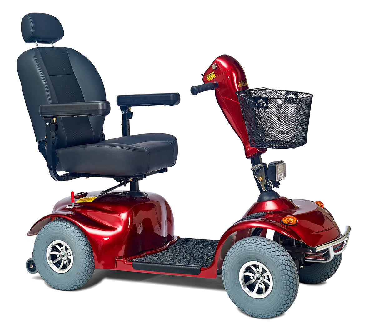 Power mobility scooter in red with four wheels, padded captain's seat with headrest, armrests, tiller, and front wire basket