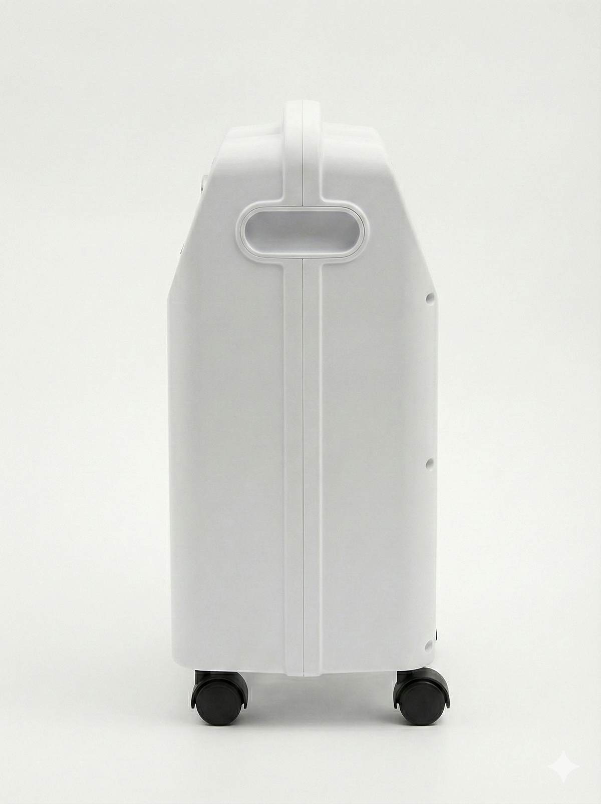 Oxygen concentrator in white with molded carry handle and four black rolling casters, shown from the side