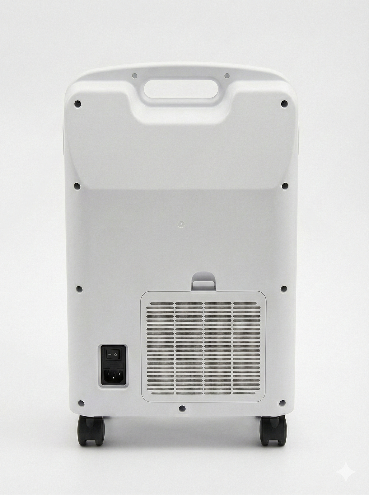 Oxygen concentrator rear view showing ventilation grille, power inlet, top carry handle, and four rolling casters on white
