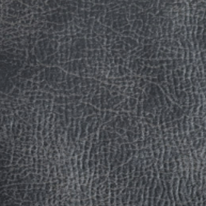Lift chair upholstery close-up showing dark gray textured fabric with a leather-like grain pattern