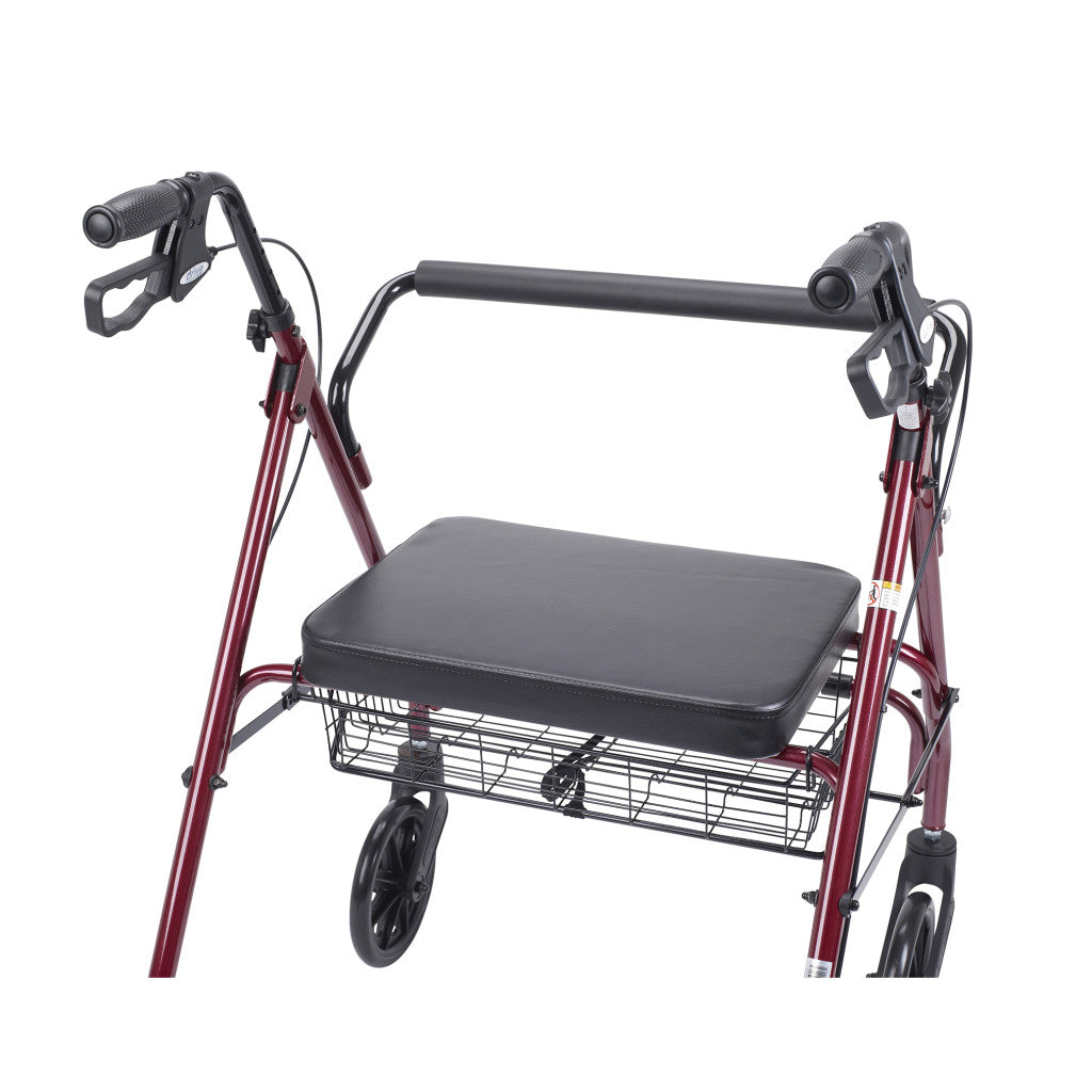 Rollator walker with red steel frame, padded black seat, back support bar, hand brakes, and wire storage basket on wheels