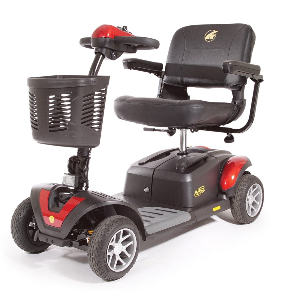 Four-wheel mobility scooter in black and red with padded captain's seat, armrests, tiller controls, and front storage basket