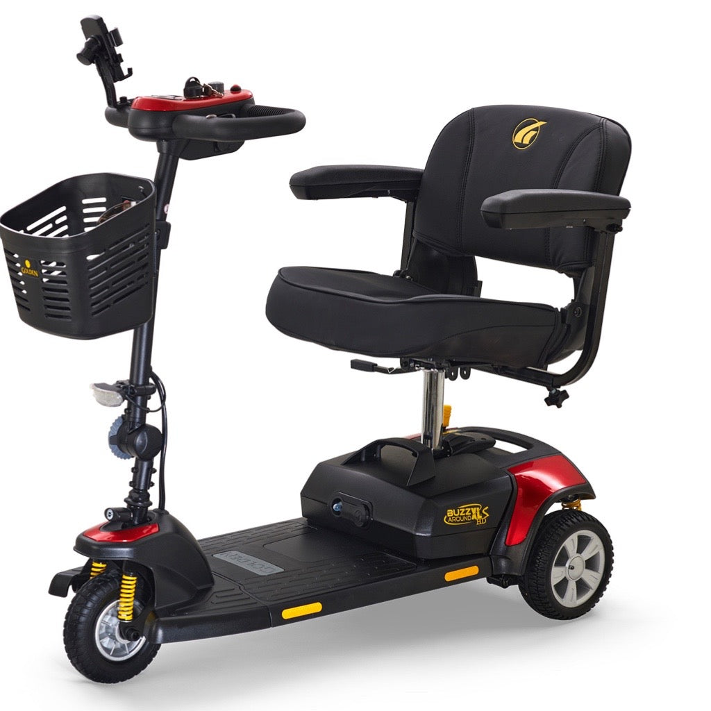 3-wheel mobility scooter in black and red with padded seat, armrests, front basket, tiller controls, and yellow shock