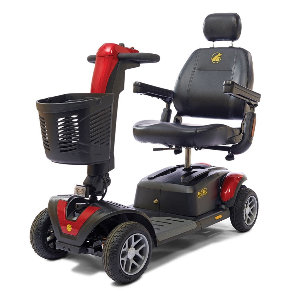 Four-wheel mobility scooter in red and black with padded captain's seat, headrest, tiller controls, and front storage basket