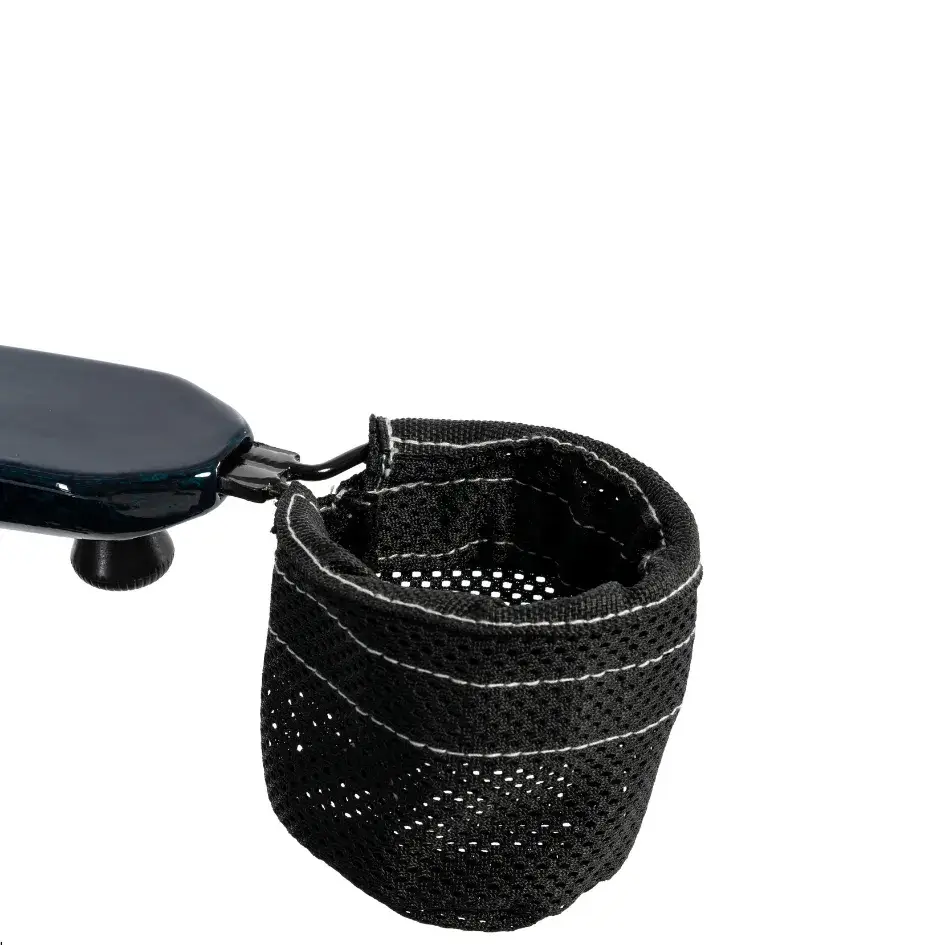 Power wheelchair cup holder in black mesh fabric clipped onto an armrest