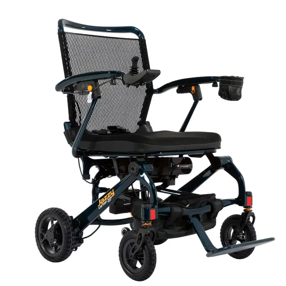 Jazzy Carbon 27 power wheelchair in dark blue with mesh back, joystick controller, padded seat, cup holder, and four-wheel