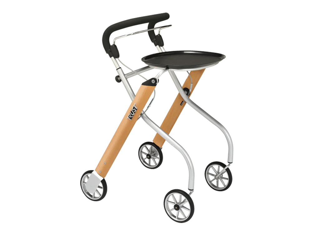 Indoor rollator with four wheels, black padded handles, attached tray, and wood-tone and silver aluminum frame