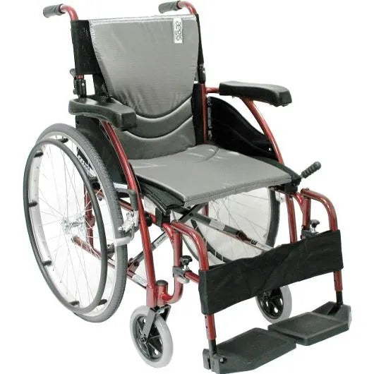 Lightweight wheelchair with red frame, gray padded seat and back, flip-up footrests, and spoke wheels