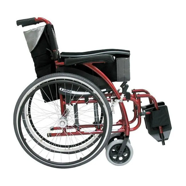 Karma S-Ergo 115 ultra lightweight wheelchair with red frame, black upholstery, spoke wheels, and swing-away footrests, side