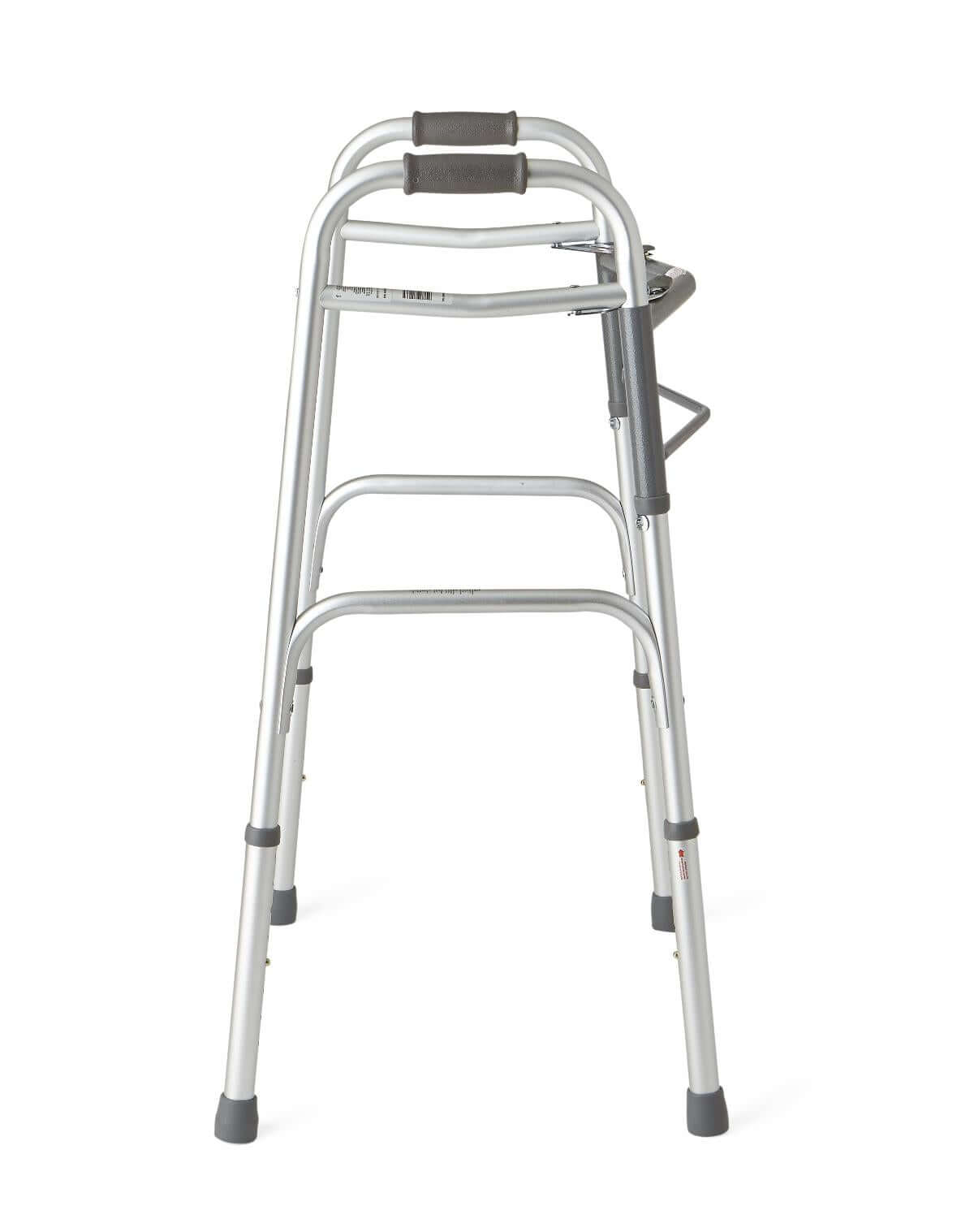Folding walker with dual release buttons, gray padded hand grips, height-adjustable legs, and rubber non-slip feet tips