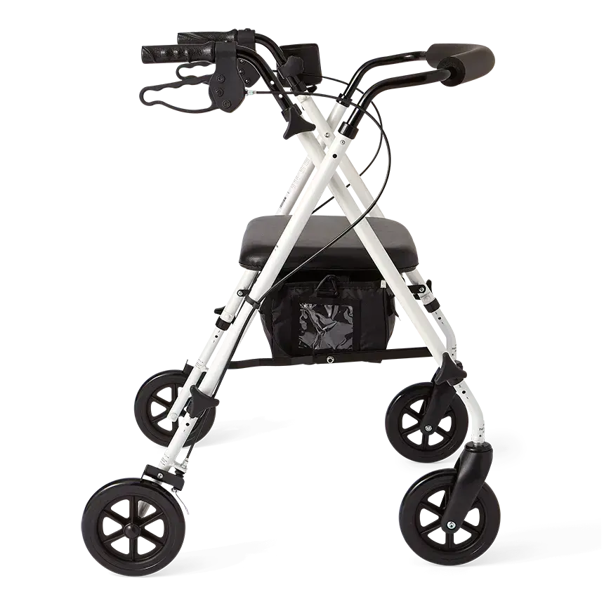 Rollator walker with white frame, padded seat, hand brakes, black storage bag, and four large black wheels