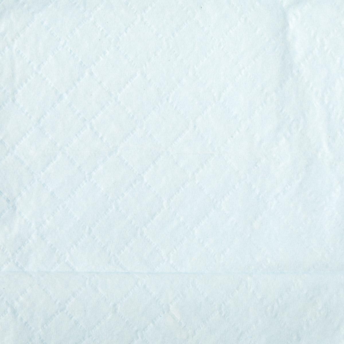 Disposable underpad with light blue quilted diamond-pattern absorbent surface, viewed flat from above