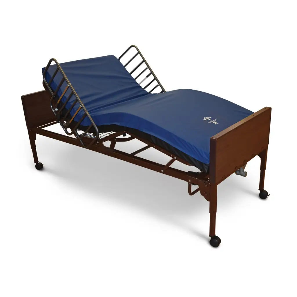 Hospital bed with raised head section, brown metal frame, side rails, casters, and blue vinyl mattress on white background