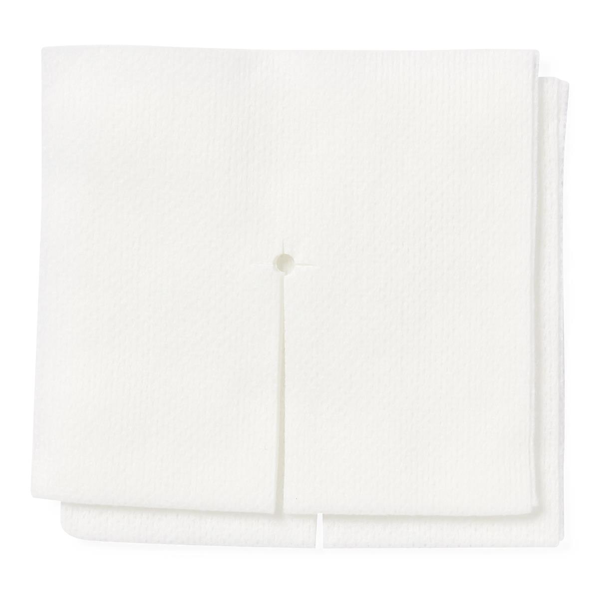 Drain sponges, two white nonwoven gauze squares with center hole and slit, stacked on white background