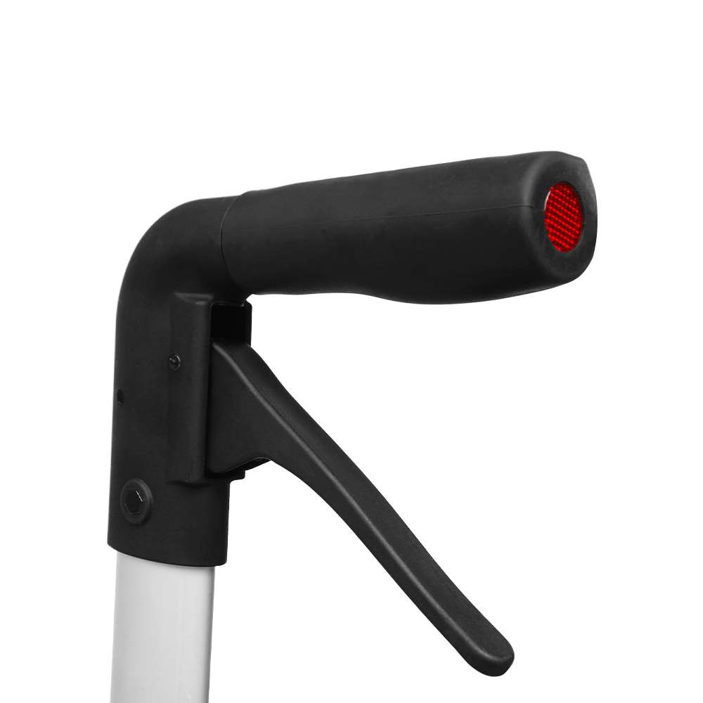 Rollator handle grip closeup showing black ergonomic handle, brake lever, and red reflector on tip
