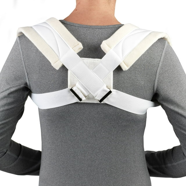 Clavicle brace with white figure-8 strap design and metal buckle closure, shown worn on a person's upper back